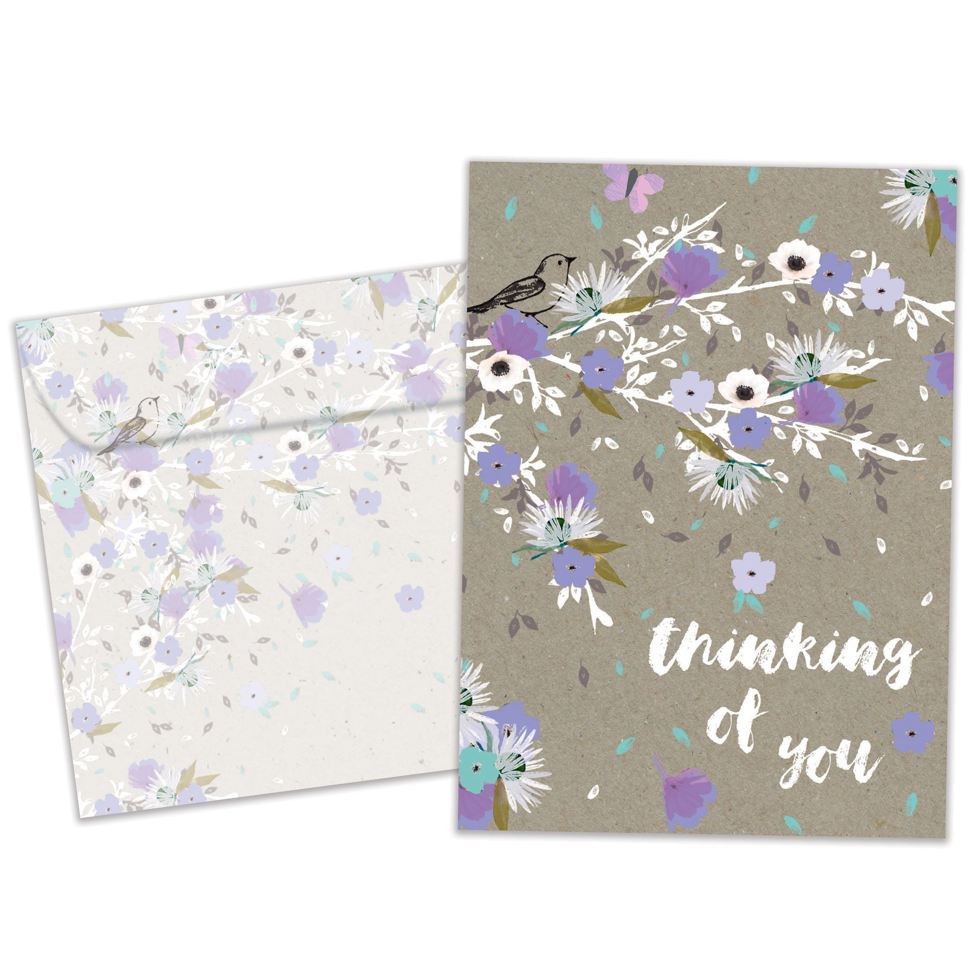 Front view of an All Occasion greeting card and matching envelope featuring purple flowers with the words 'Thinking of You' in a thoughtful, elegant design.