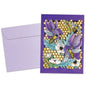 Front view of an All Occasion greeting card and matching envelope featuring honeycomb, bees, and flowers in a vibrant design.