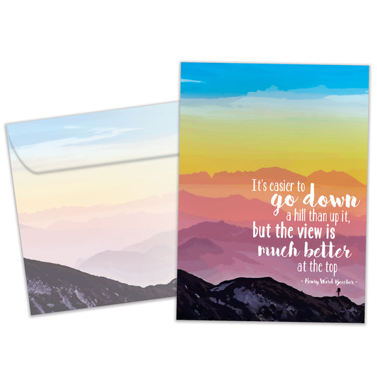 Front view of an All Occasion greeting card and matching envelope featuring an illustration of a person climbing a mountain with an inspirational message about the view from the top.