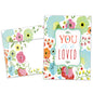 Front view of an All Occasion greeting card and matching envelope featuring the message 'You are so loved' surrounded by soft-coloured flowers in a delicate design.