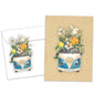 Front view of an All Occasion greeting card and matching envelope featuring an illustration of a van overflowing with flowers and the word 'Love' on the licence plate.