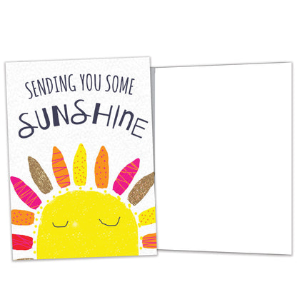 Front and inside view of an All Occasion greeting card featuring a sun illustration with 'Sending You Some Sunshine,' with matching design details inside.
