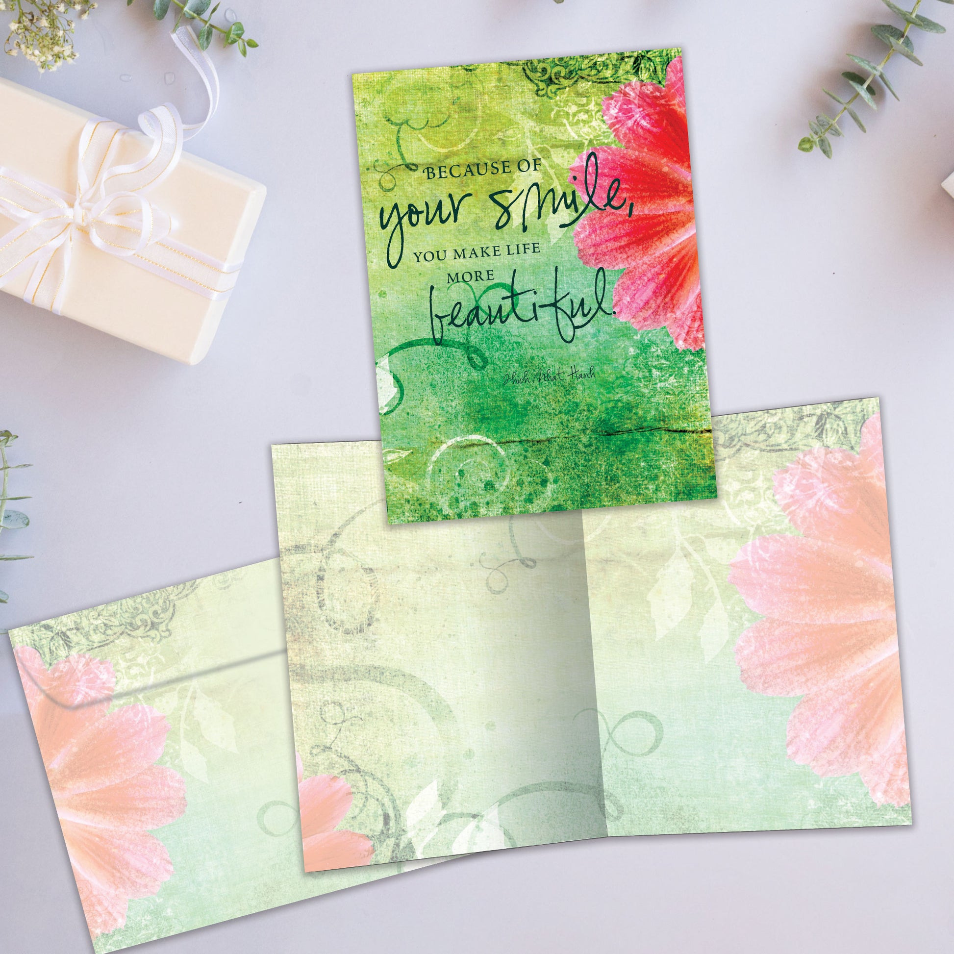 Front and inside view of an All Occasion greeting card showcasing a floral design and a lovely message, along with a matching envelope.