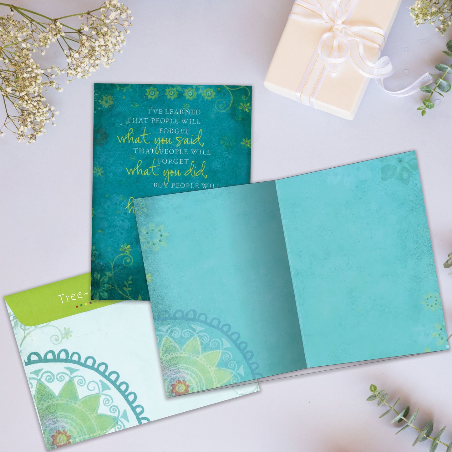 Front and inside view of an All Occasion greeting card showcasing intricate artwork and a heartfelt message about how people remember how you made them feel, with a matching envelope.