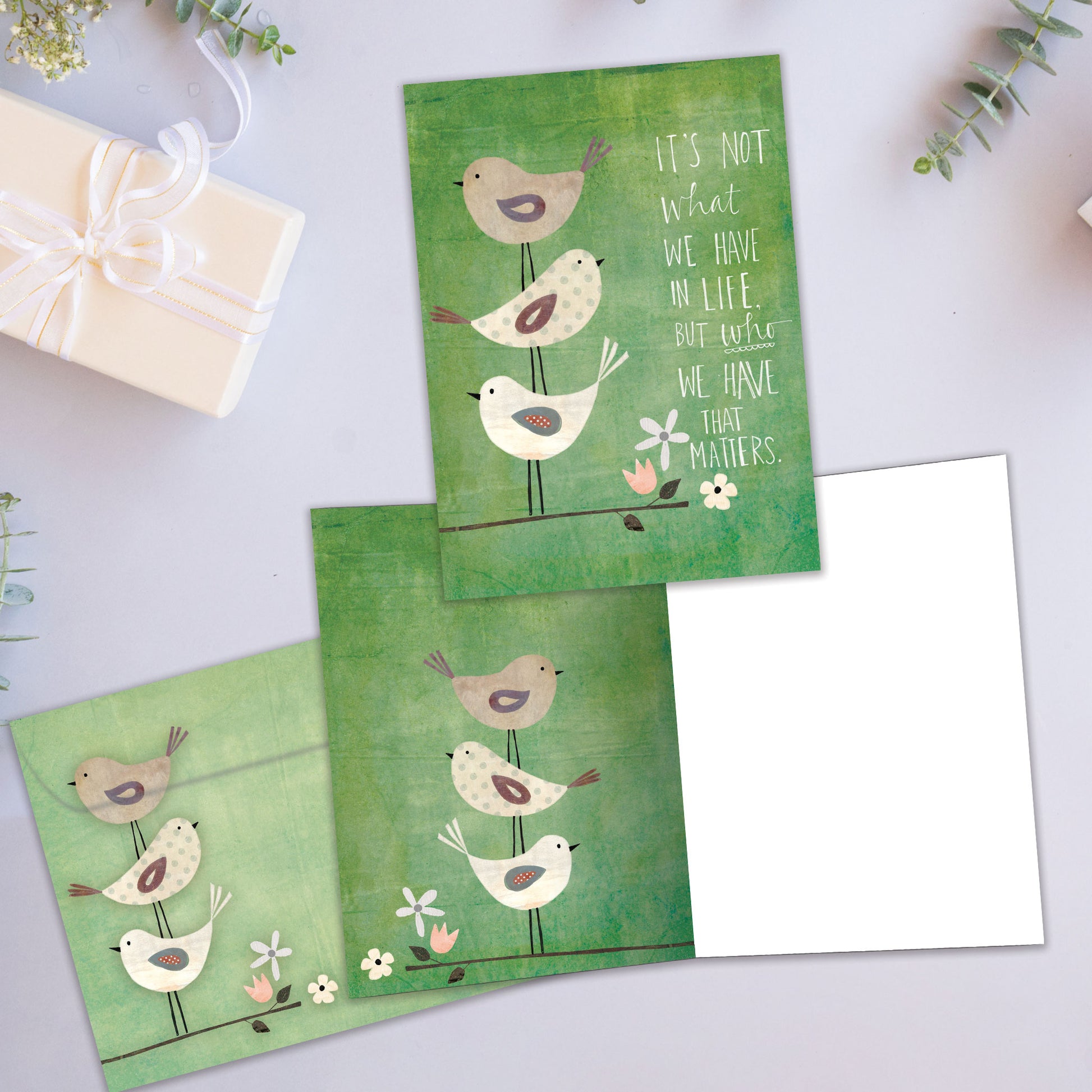 Front and inside view of an All Occasion greeting card showcasing birds on a branch and a heartfelt message about who we have in our lives, with a matching envelope.