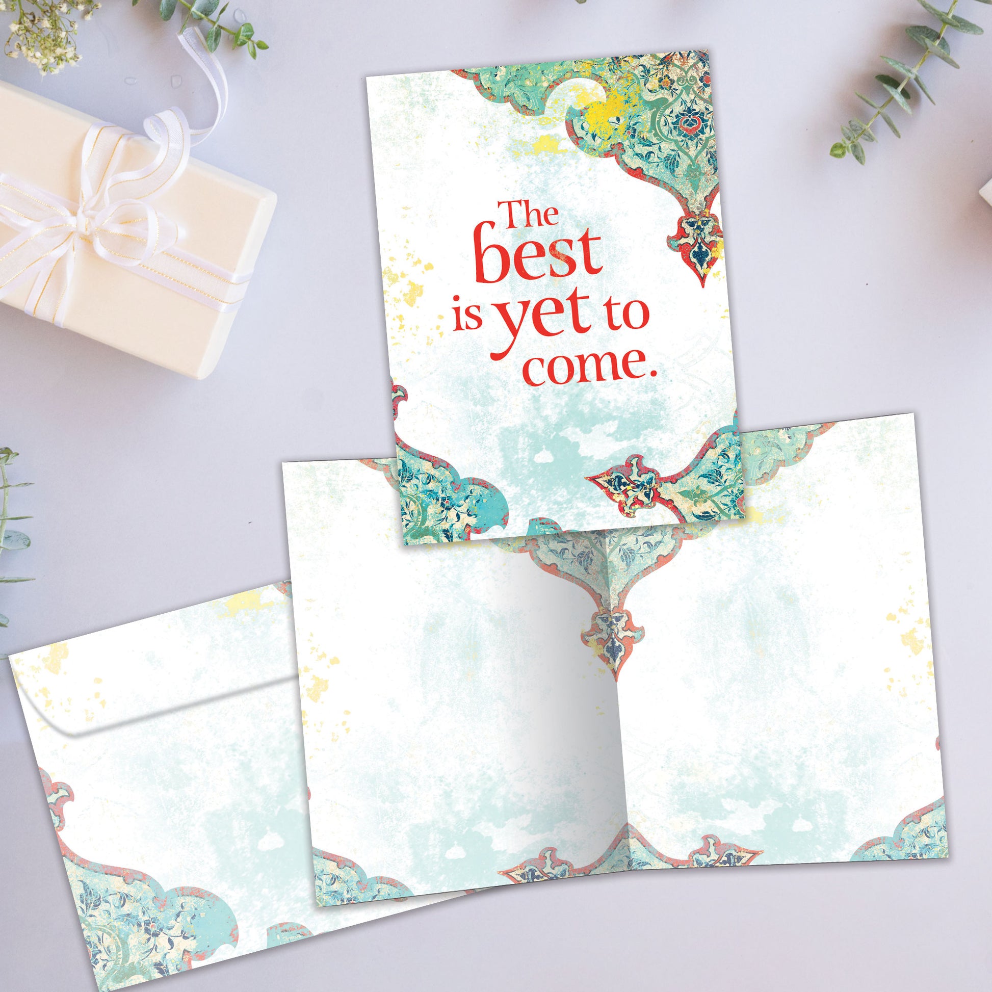 Front and inside view of an All Occasion greeting card showcasing an illustration with 'The Best Is Yet to Come' text, with a matching envelope.
