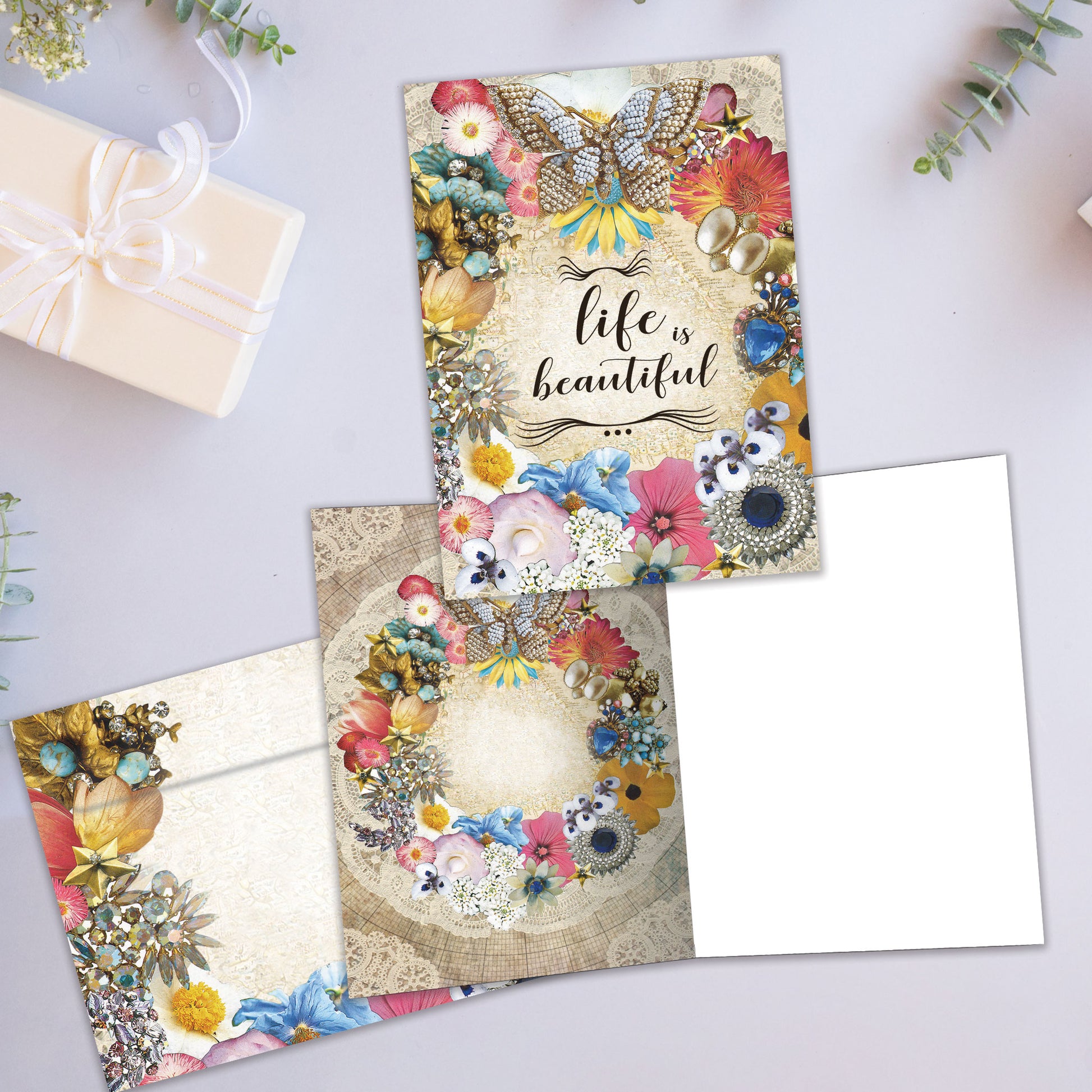 Front and inside view of an All Occasion greeting card showcasing 'Life is Beautiful' with a stunning illustration, with a matching envelope.