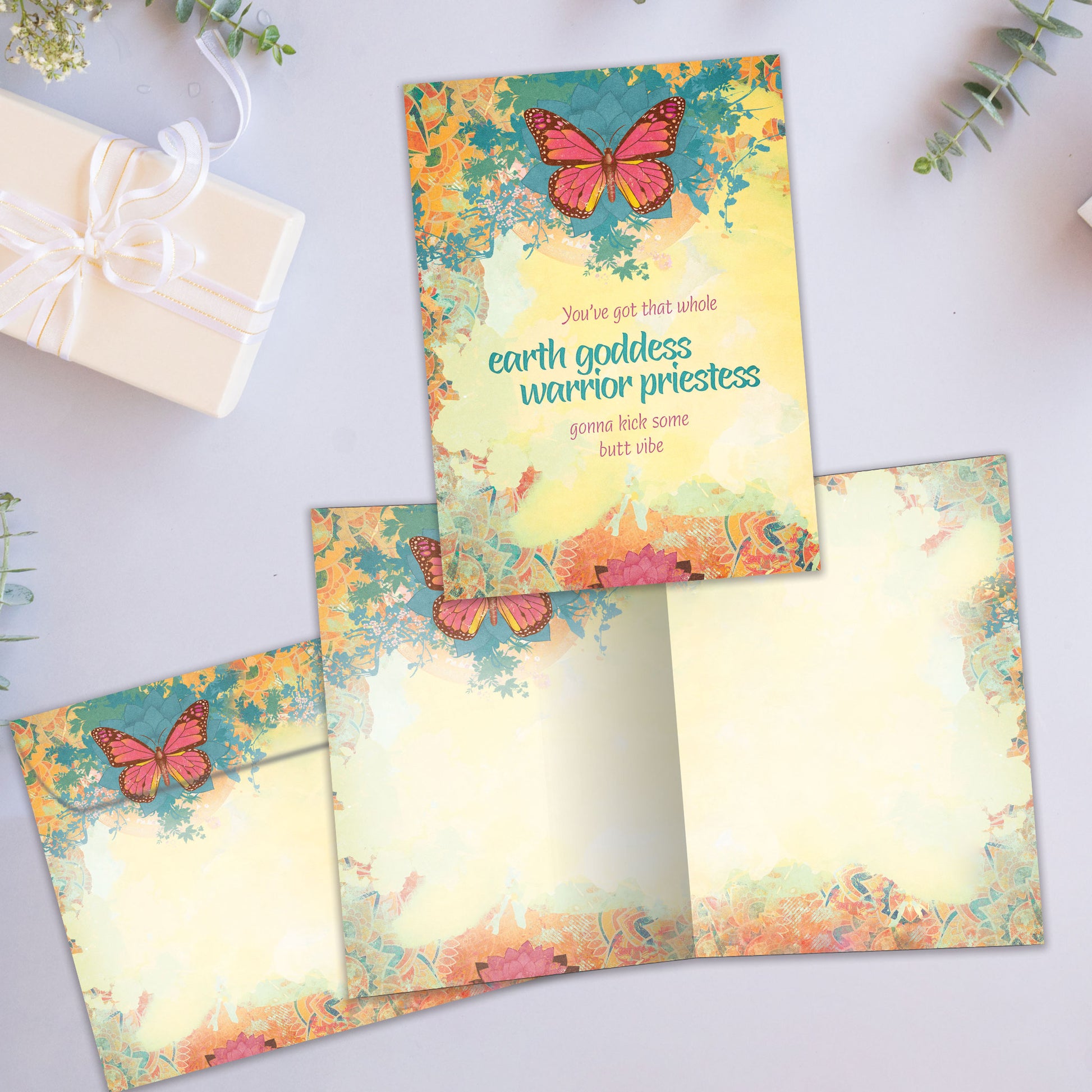 Front and inside view of an All Occasion greeting card showcasing a butterfly and floral design along with an uplifting message, with a matching envelope.