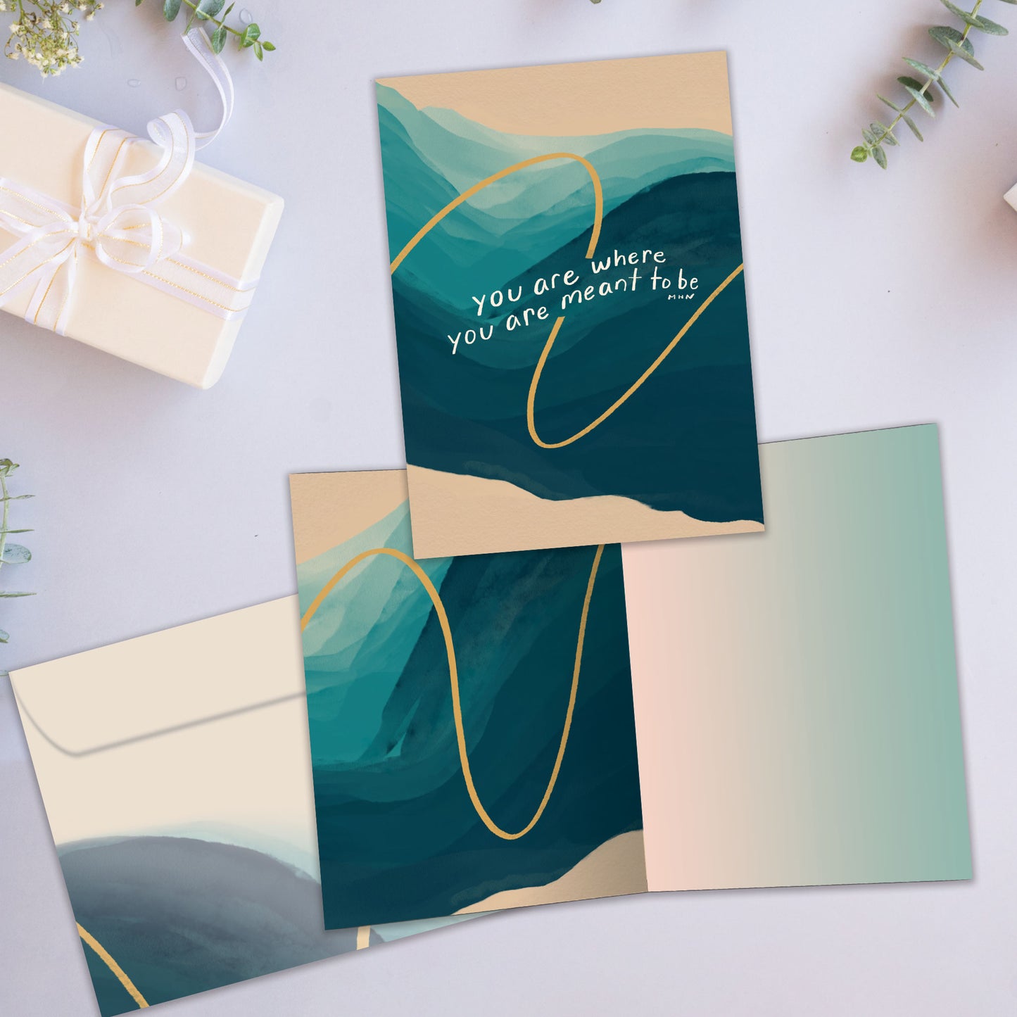 Front and inside view of an All Occasion greeting card showcasing the message 'You are where you are meant to be' on a calm background, with a matching envelope.