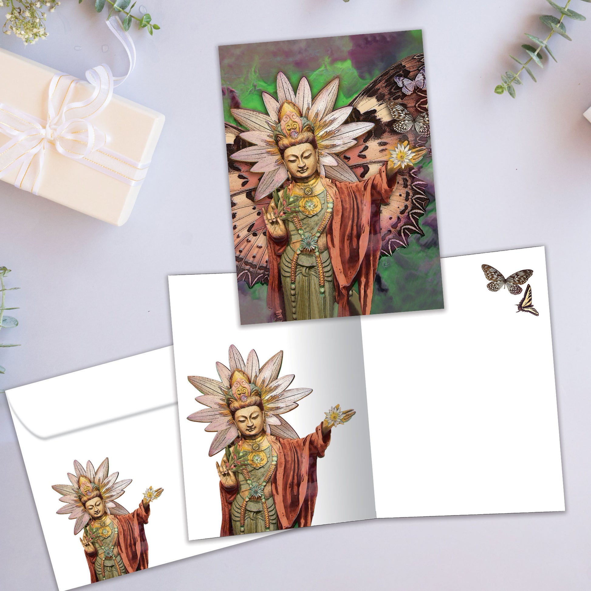 Front and inside view of an All Occasion greeting card showcasing an illustration of a Buddha with butterfly wings, with a matching envelope.