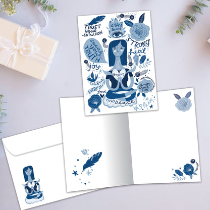 Front and inside view of an All Occasion greeting card showcasing a woman meditating, surrounded by peaceful messages, with blue imagery and matching envelope.