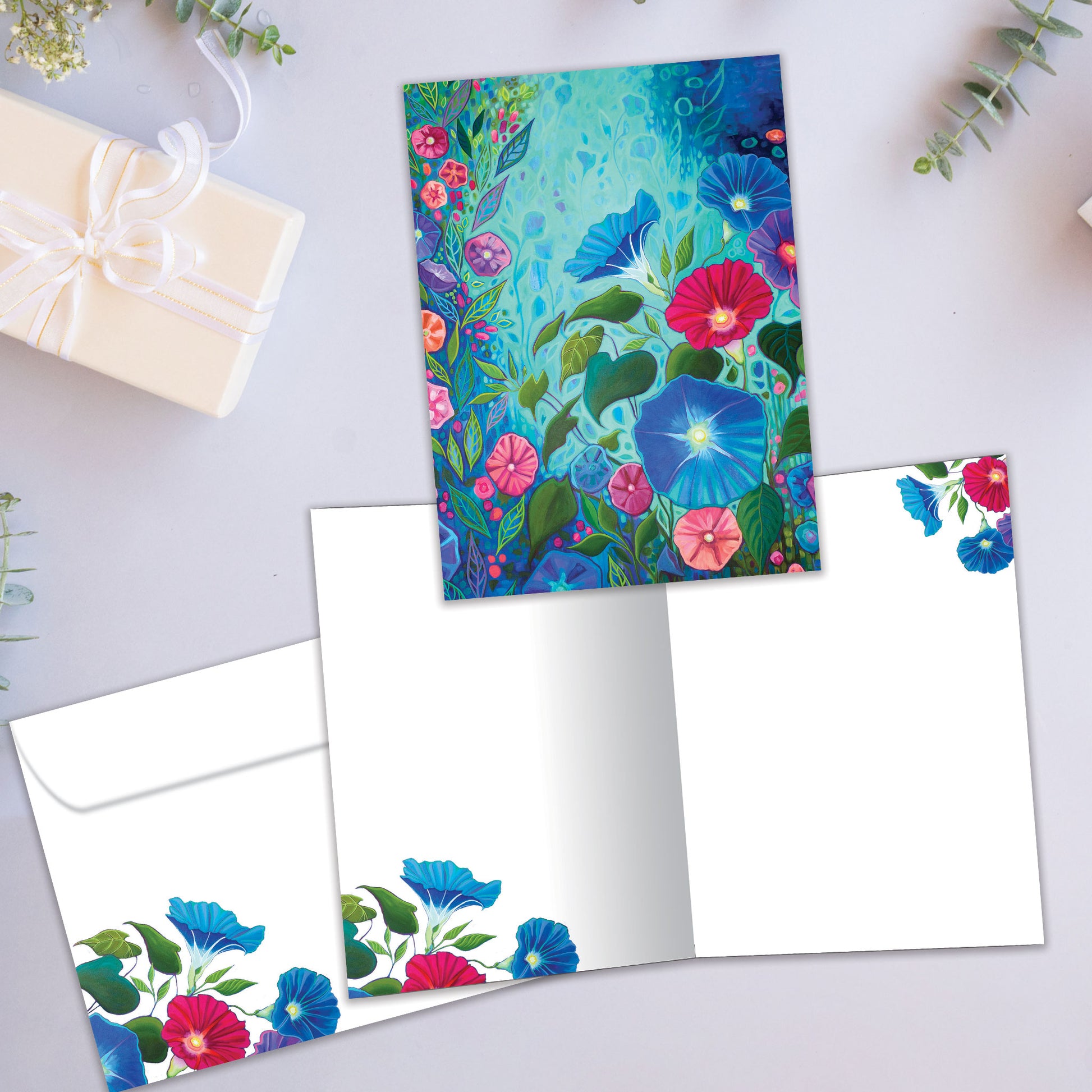 Front and inside view of an All Occasion greeting card showcasing beautiful flowers in rich, vibrant colours on the cover, with a matching envelope.