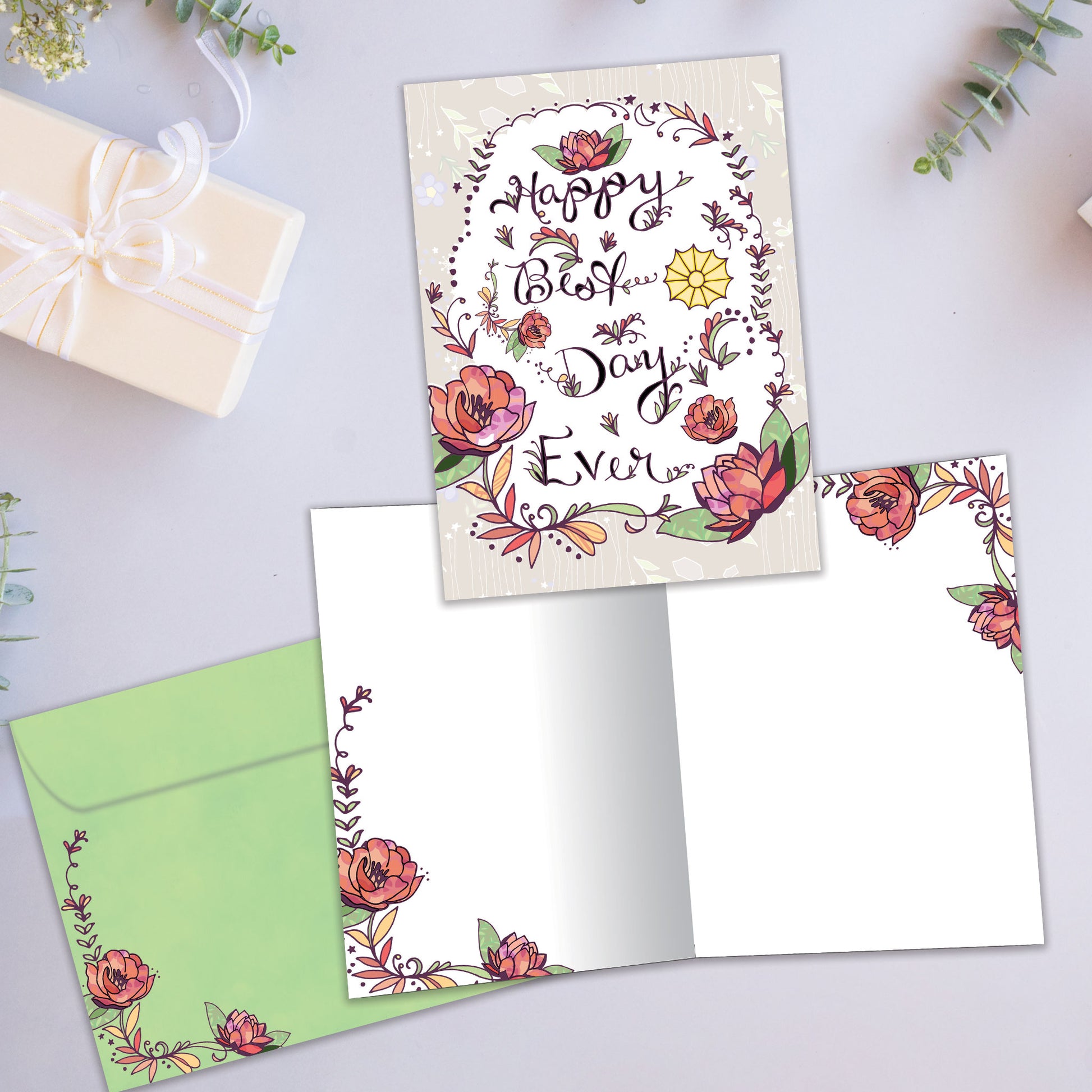 Front and inside view of an All Occasion greeting card with 'Happy best day ever' surrounded by an intricate floral design, with a matching envelope.