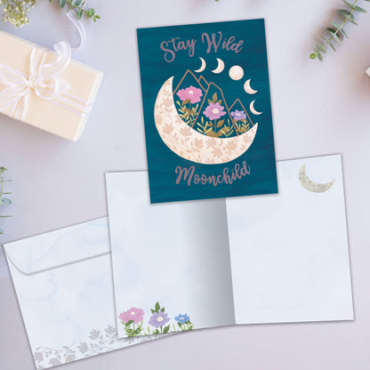 Front and inside view of an All Occasion greeting card featuring a moon and flowers on a dark blue background, plus a matching envelope.