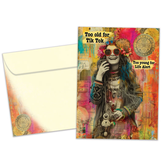 Front view of a Birthday greeting card featuring an illustration of a happy hippie-like woman, with a matching envelope.