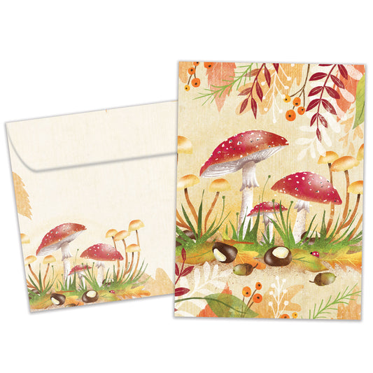 Front view of an All Occasion greeting card and matching envelope with a vibrant illustration of colourful mushrooms in a lush forest.