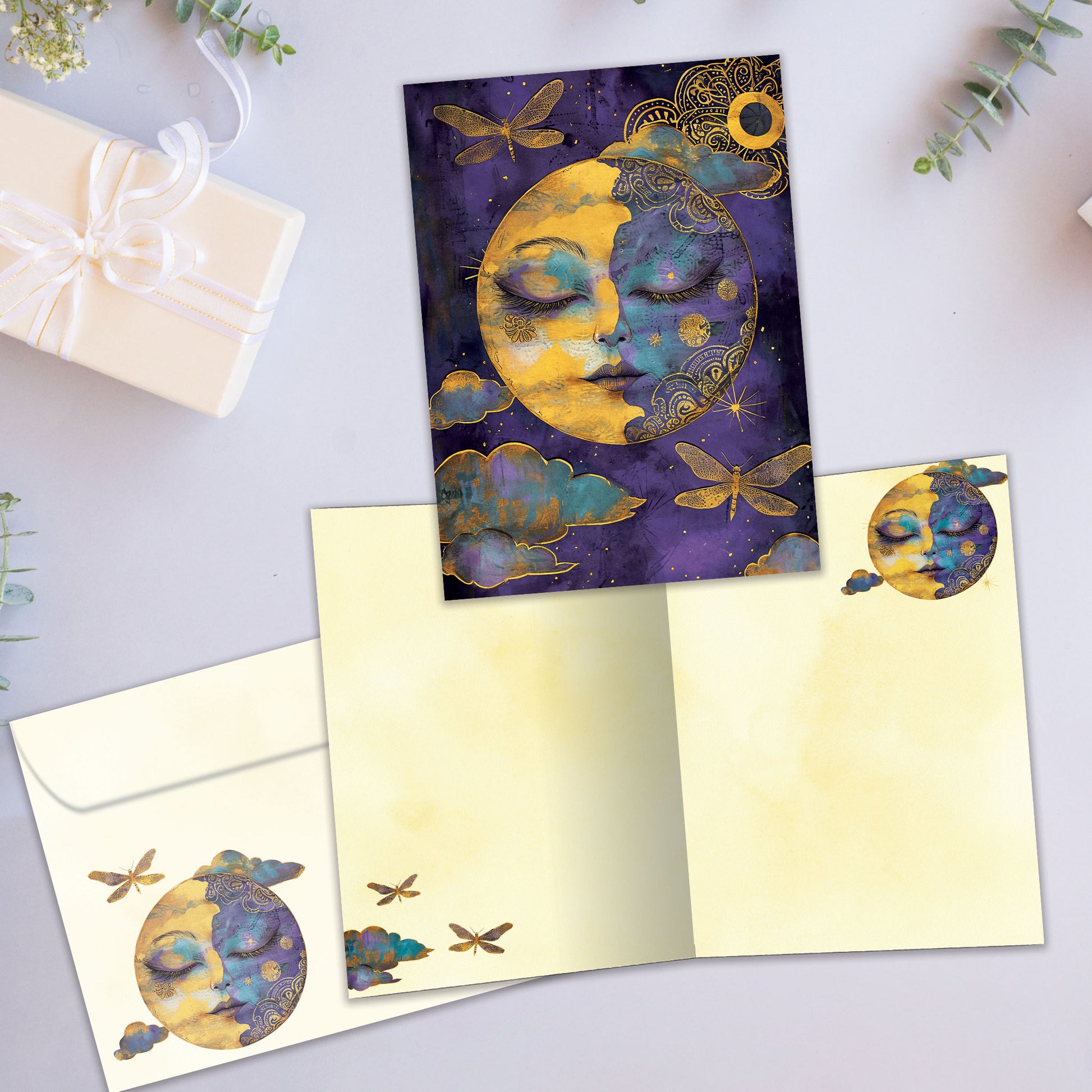 Front and inside view of an All Occasion greeting card with a golden serene moon on a purple night sky, plus matching envelope design.