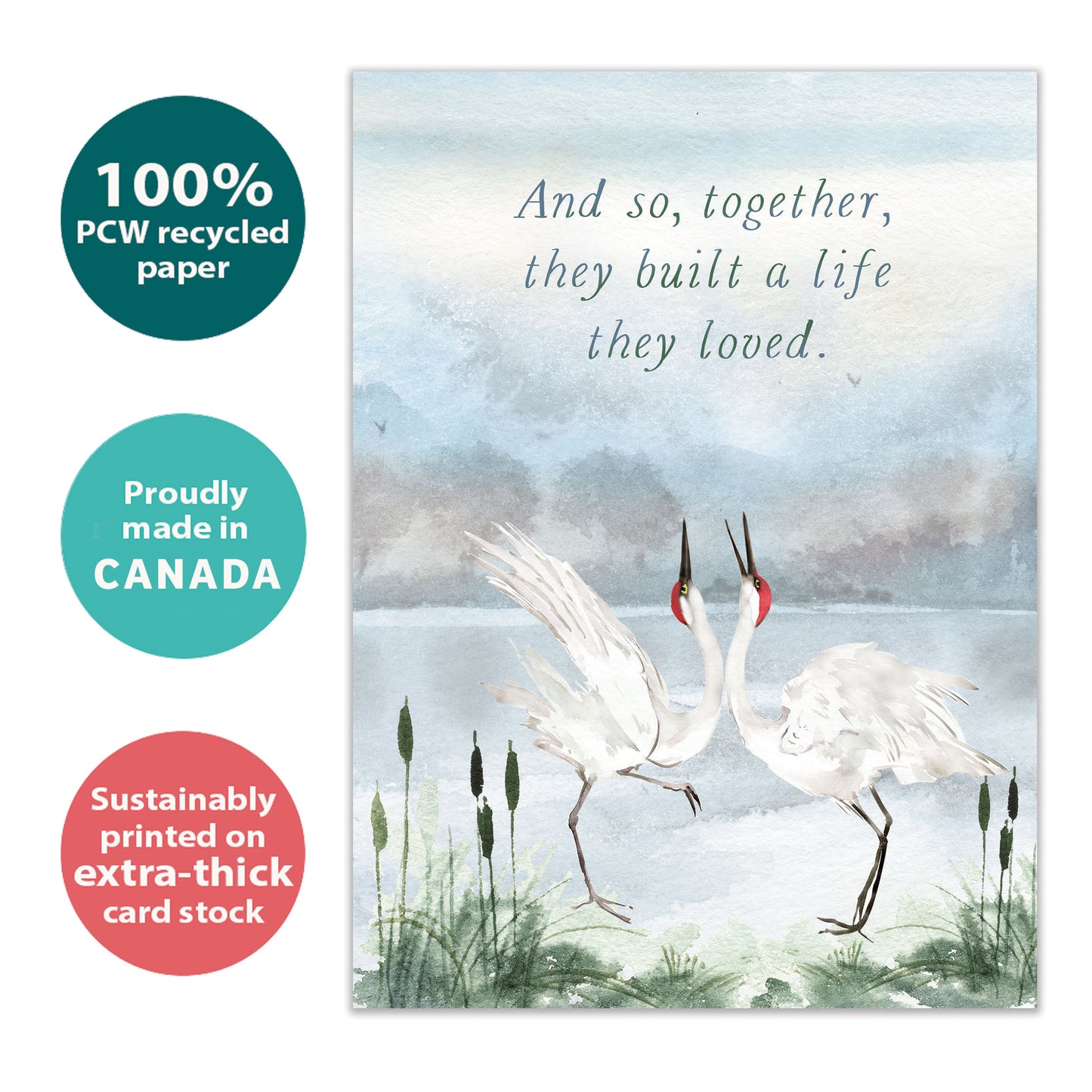 Front view of an Anniversary greeting card with an illustration of two cranes dancing, highlighting its eco-friendly materials and made in Canada.