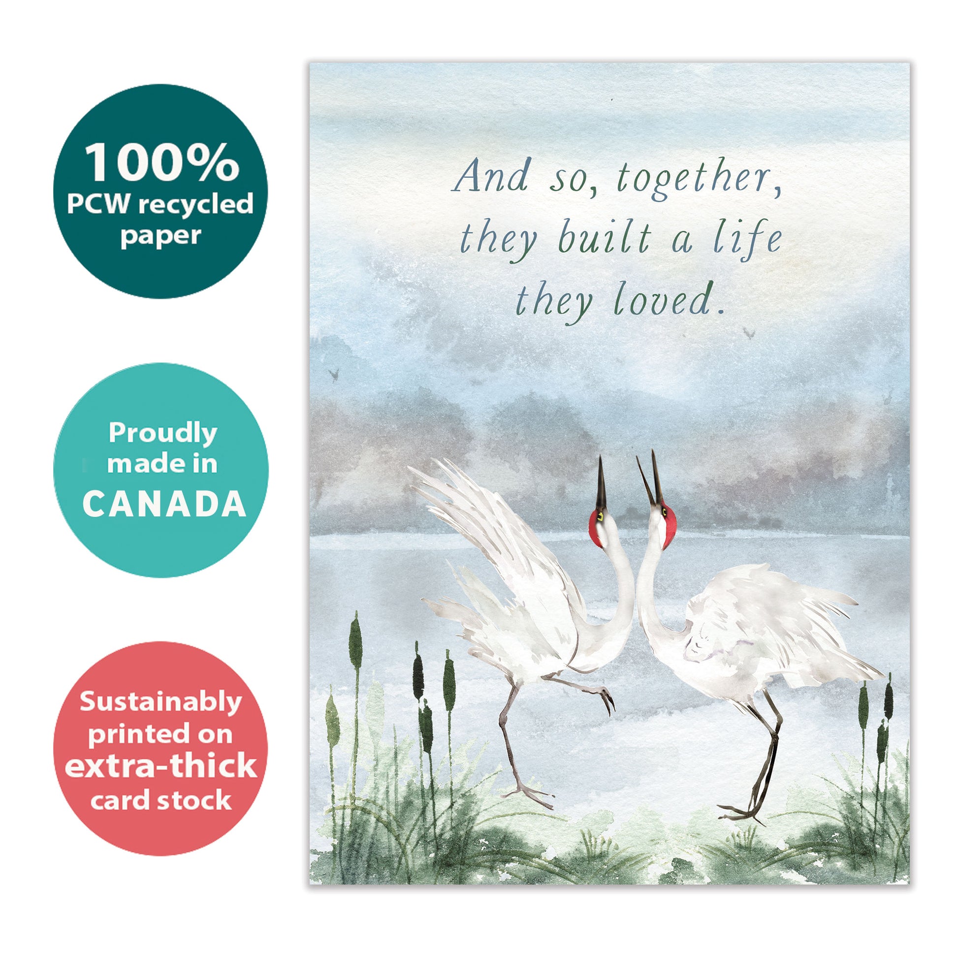 Front view of an Anniversary greeting card with an illustration of two cranes dancing, highlighting its eco-friendly materials and made in Canada.