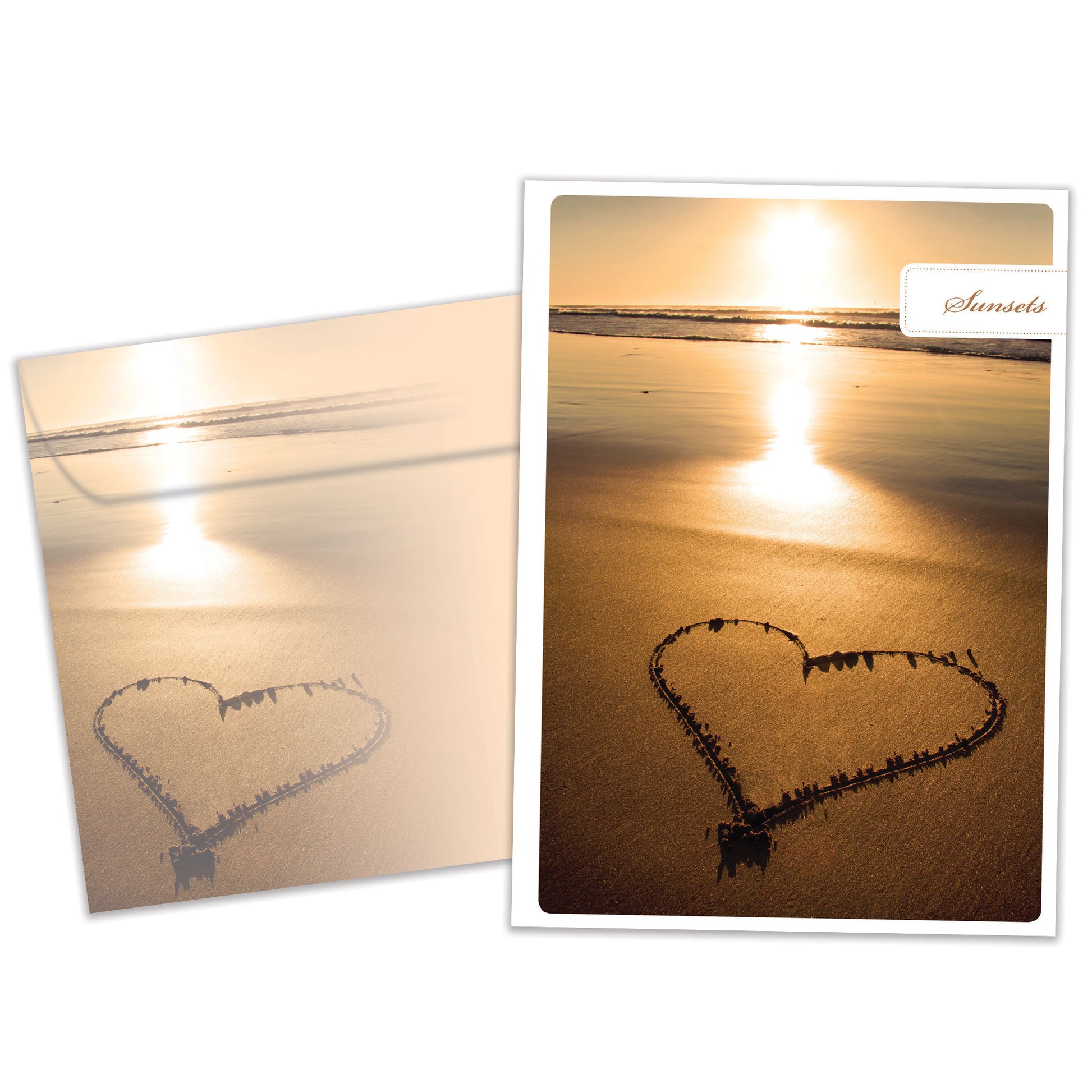 Front view of an Anniversary greeting card and matching envelope featuring a photo of a sunset with a heart drawn in the sand.