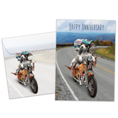 Front view of an Anniversary greeting card and matching envelope featuring two dogs riding a motorcycle.