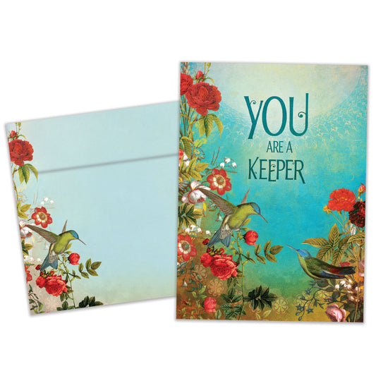 Front view of an Anniversary greeting card and matching envelope featuring a beautiful illustration of birds and flowers with the message "You are a keeper."