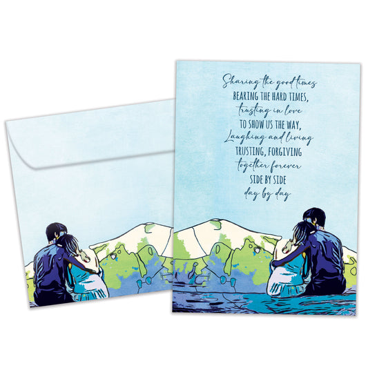 Front view of an Anniversary greeting card and matching envelope featuring an illustration of an affectionate couple and a loving message of togetherness.
