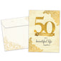Front view of an Anniversary greeting card and matching envelope featuring "50 golden years of a beautiful life together" in gold writing.