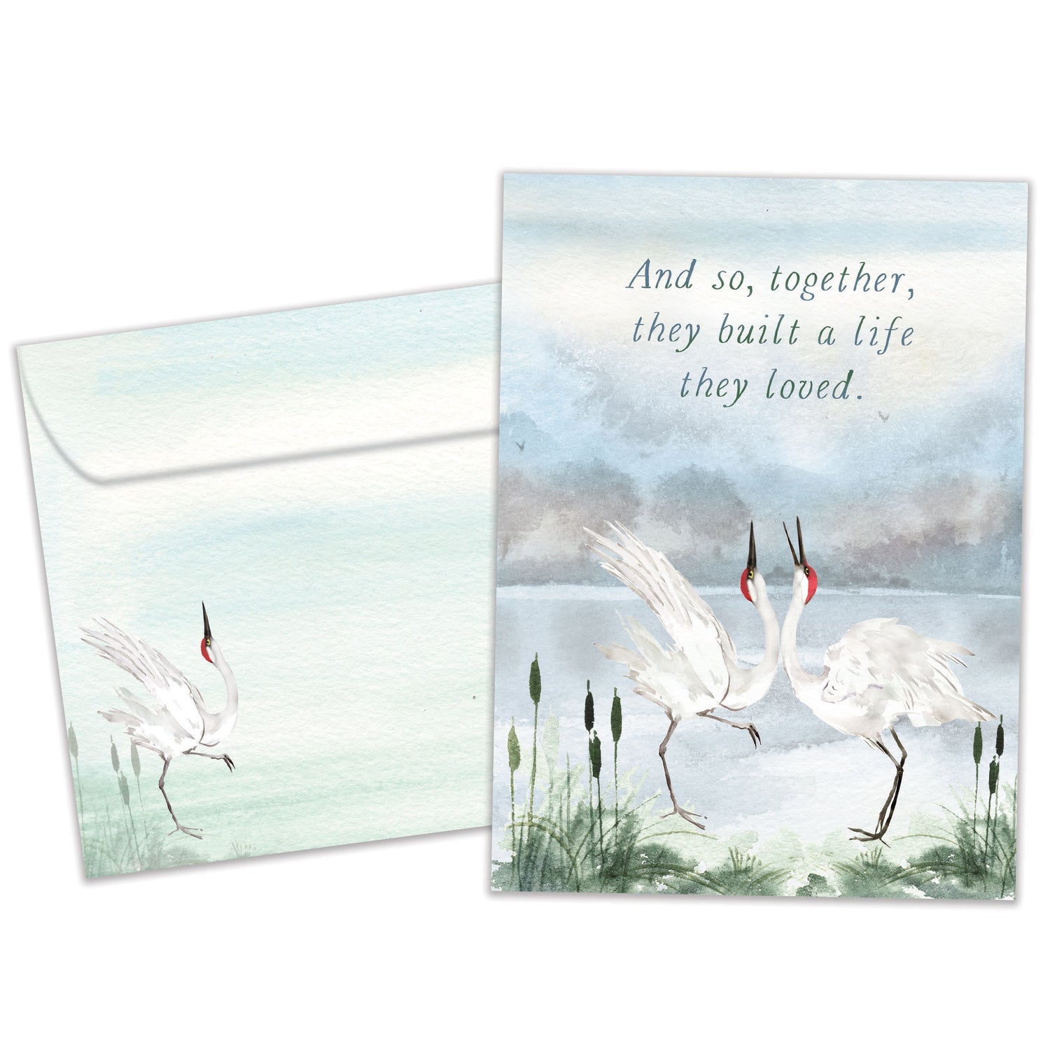 Front view of an Anniversary greeting card and matching envelope featuring two dancing cranes symbolizing togetherness.
