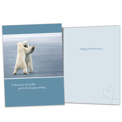 Front and inside view of an Anniversary greeting card featuring two polar bears dancing, with matching design details inside.