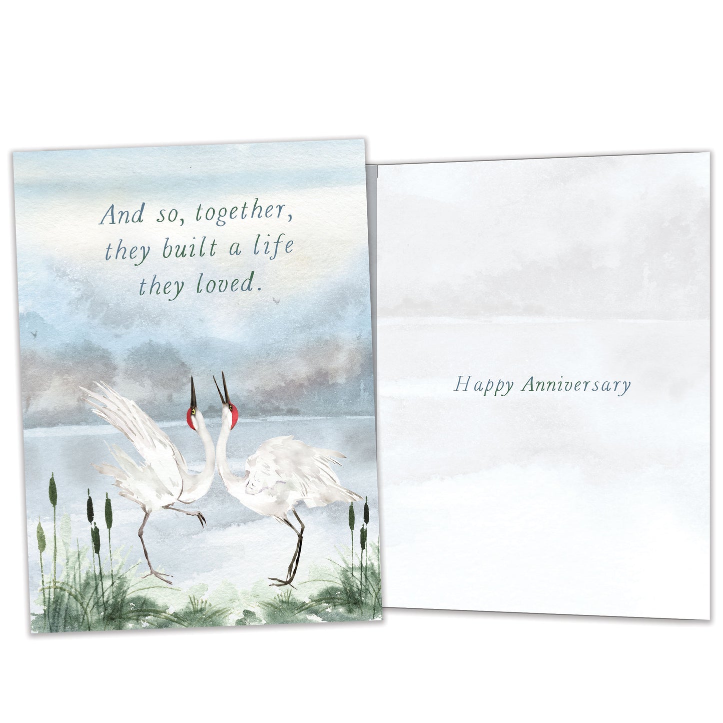 Front and inside view of an Anniversary greeting card featuring two cranes dancing together, with matching design details inside.