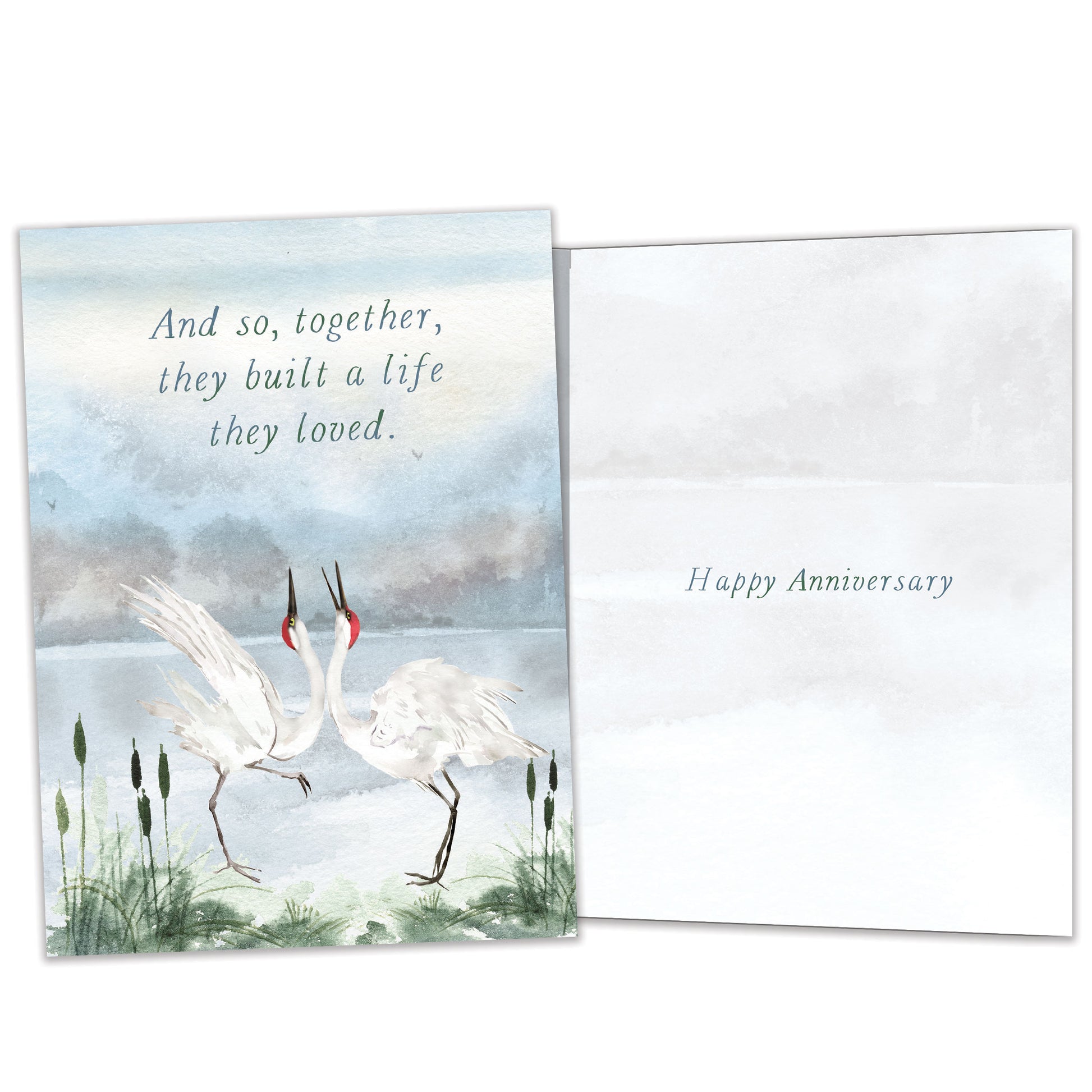 Front and inside view of an Anniversary greeting card featuring two cranes dancing together, with matching design details inside.