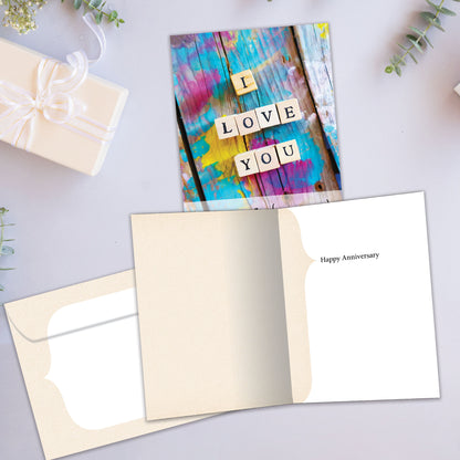 Front and inside view of an Anniversary greeting card showcasing the message "I love you" with the word "cherish," with a matching envelope.