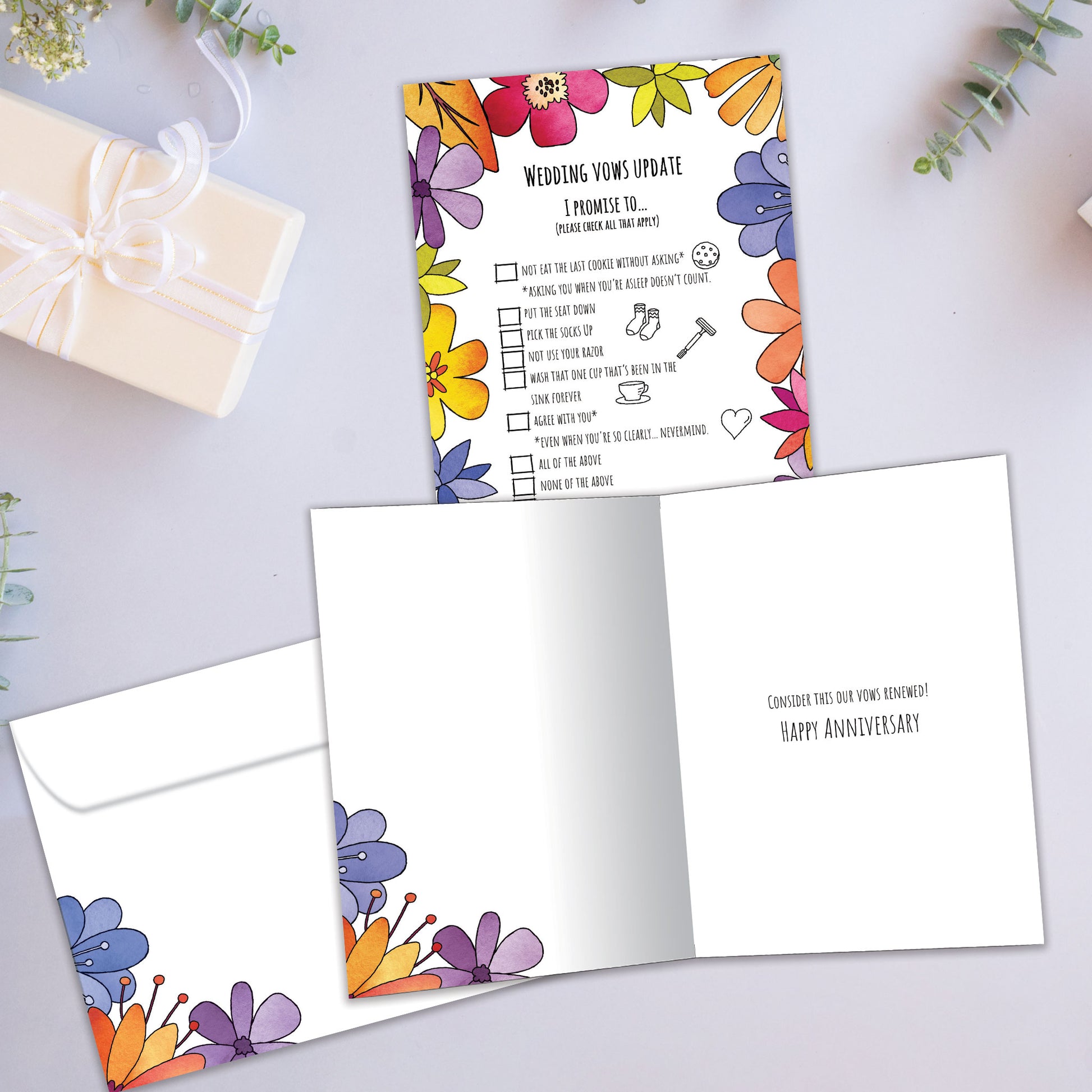 Front and inside view of an Anniversary greeting card showcasing a list of wedding vows update with floral accents, with a matching envelope.