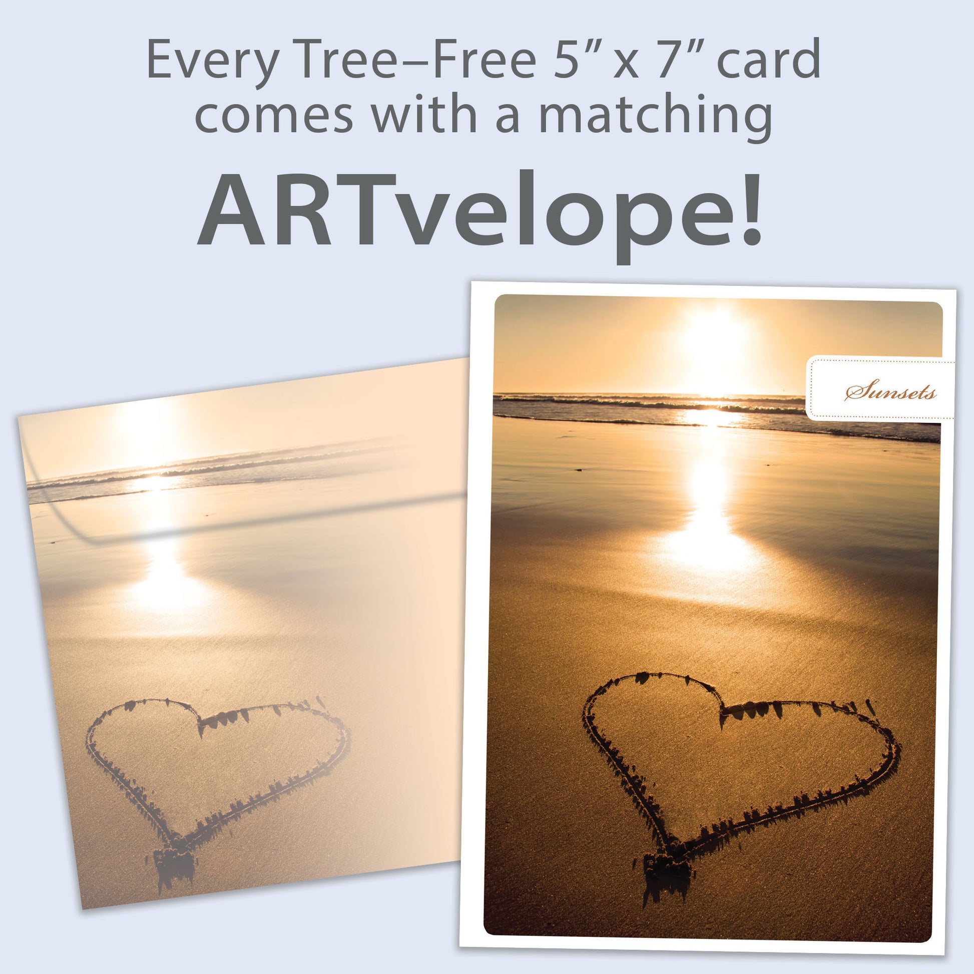 Front view of an Anniversary greeting card featuring a sunset photo with a heart drawn in the sand, with matching envelope artwork.