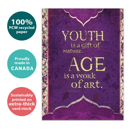 Front view of a Birthday greeting card with a message about age and art on a purple artistic background, highlighting its eco-friendly materials and made in Canada.