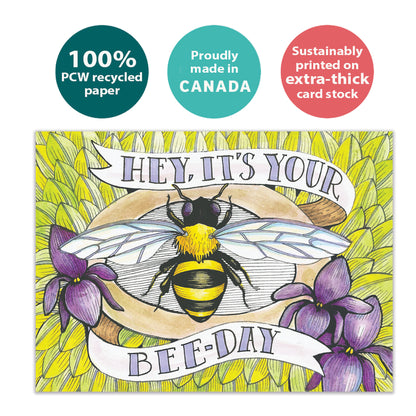 Front view of a Birthday greeting card with the message "Hey, it's your bee-day" and a bee illustration, highlighting its eco-friendly materials and made in Canada.