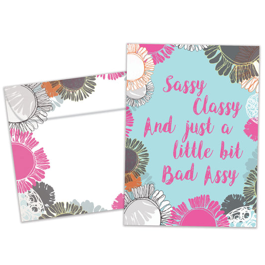 Front view of a Birthday greeting card and matching envelope featuring the message "Sassy classy and just a little bit bad assy."