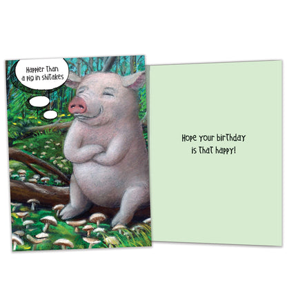Front and inside view of a Birthday greeting card featuring a happy pig on a log with "Happier than a pig in shiitakes" and matching design details inside.