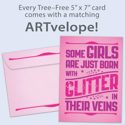 Front view of a Birthday greeting card featuring a cheerful message about girls born with glitter on a pink background, with matching envelope artwork.