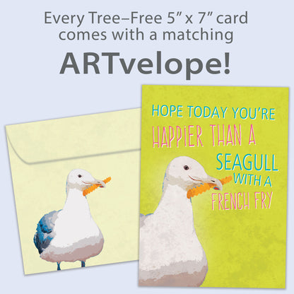 Front view of a Birthday greeting card featuring a seagull holding a french fry, with matching envelope artwork.