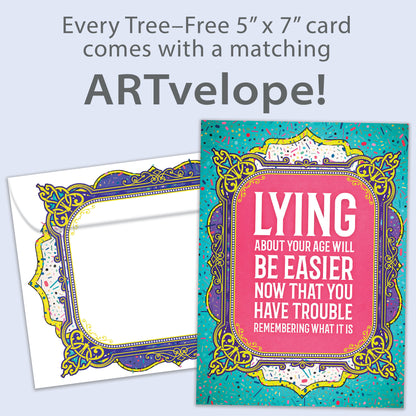 Front view of a Birthday greeting card featuring a funny message about lying about your age on a pink and teal background, with matching envelope artwork.